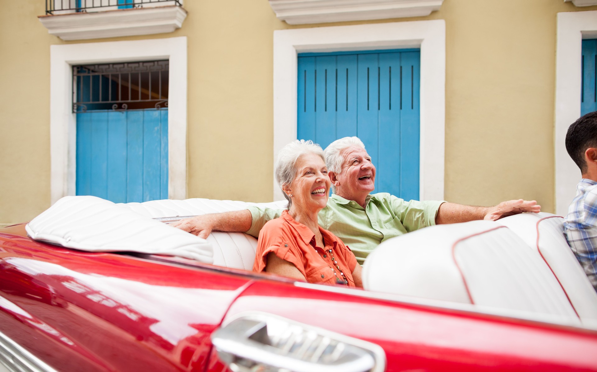 Excited senior couple visiting Cuba