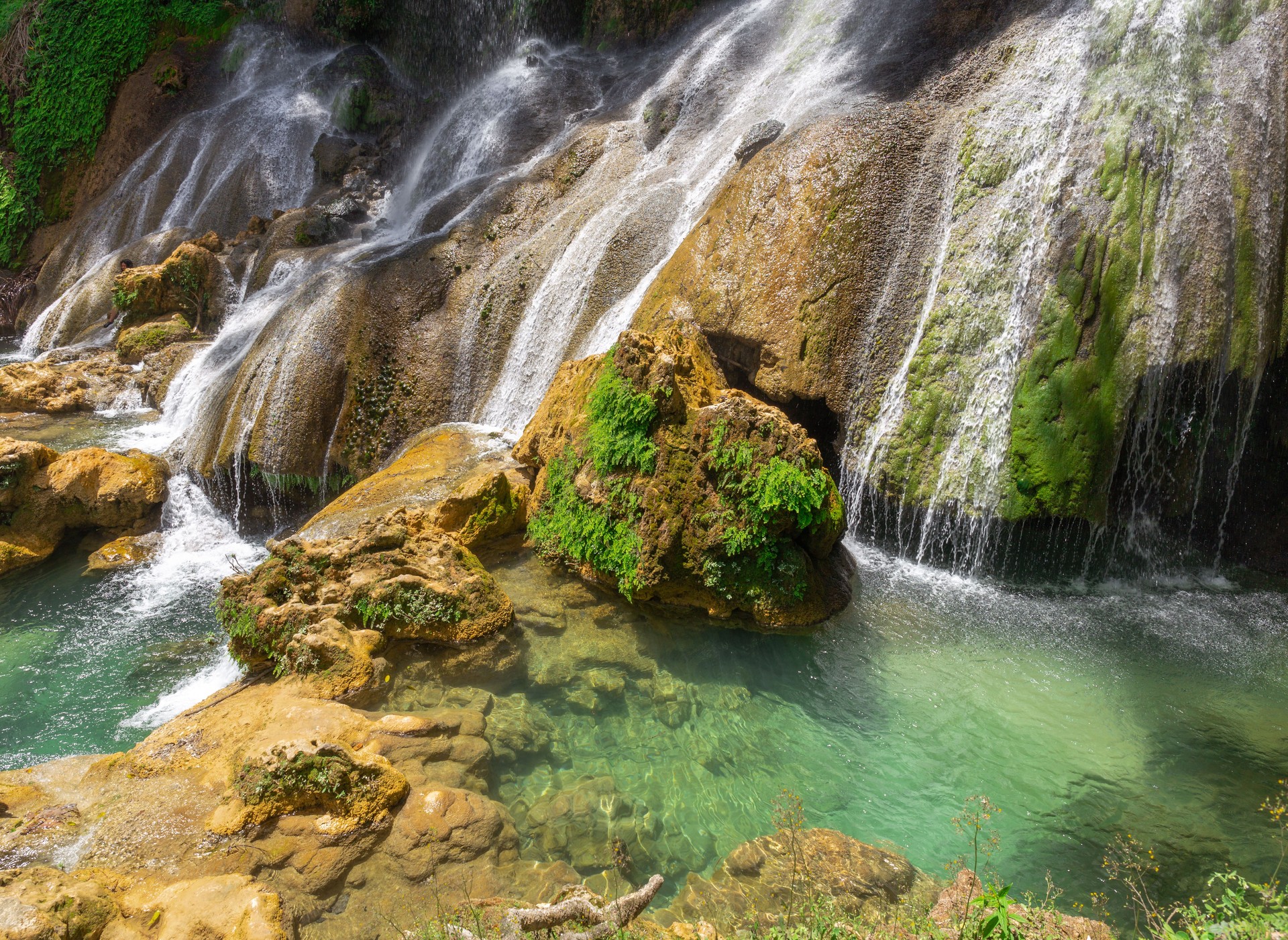 El Nicho - a waterfall in Topes de Collantes, a national natural park of Cuba El Nicho - a waterfall in Topes de Collantes, a national natural park of Cuba